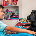 Adam with Autism Assistance Dog Comet
