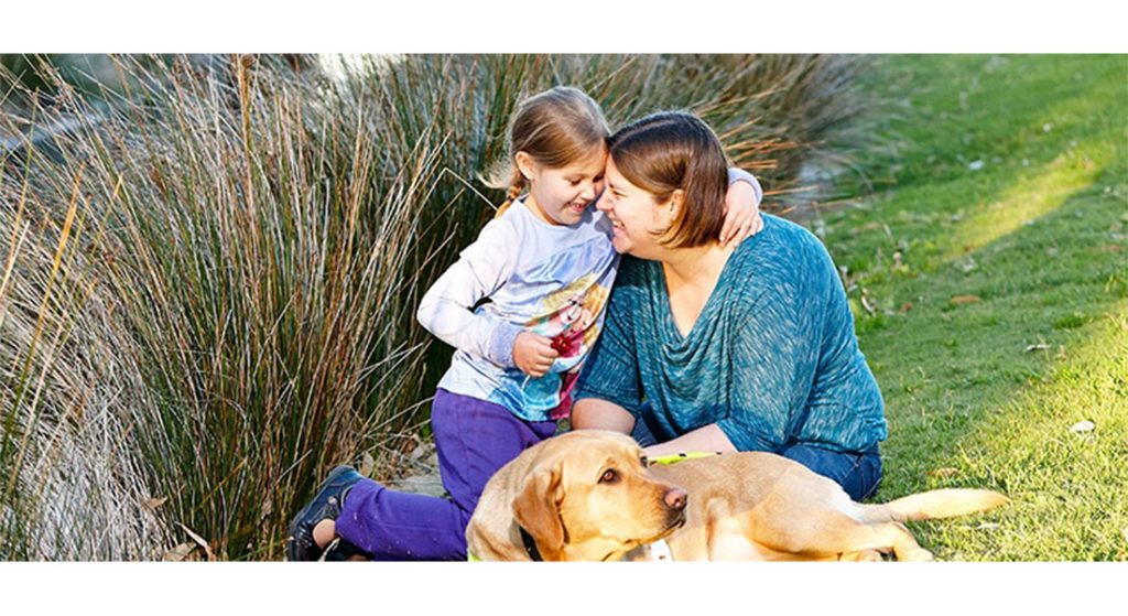 Amy with daughter Eleanor with Guide Dog Mena